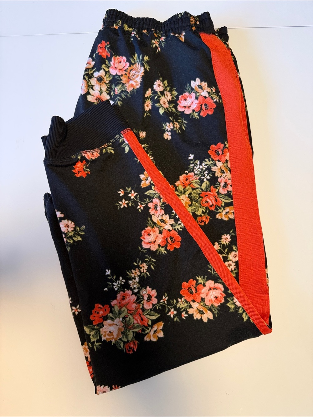 LuLaRoe Black Floral Track Joggers with Red Stripe